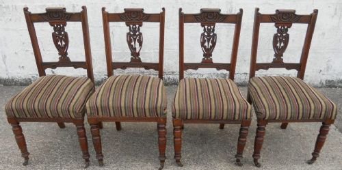 Set of Four Edwardian Carved Walnut Dining Chairs