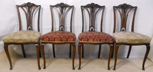 Set of Four Edwardian Carved Mahogany Salon Chairs