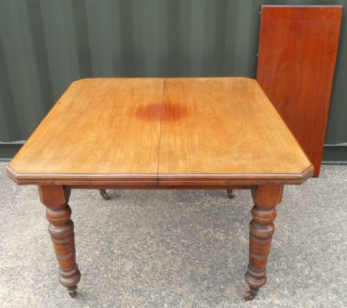 EDWARDIAN MAHOGANY EXTENDING DINING TABLE - ADDITIONAL PHOTO 1