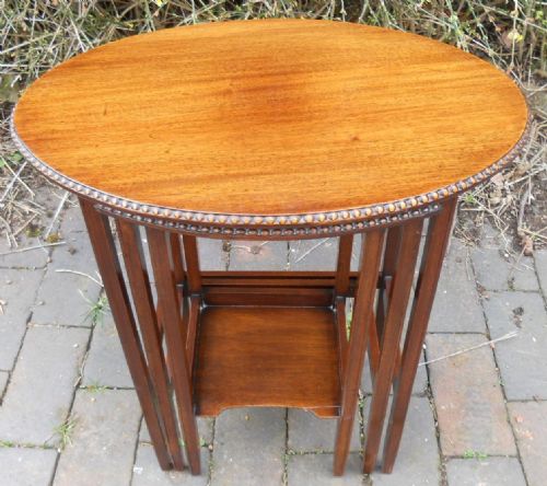 OVAL TOP MAHOGANY NEST OF THREE COFFEE TABLES - ADDITIONAL PHOTO 3