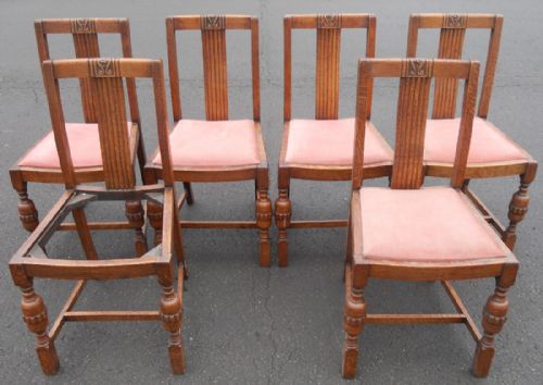 Set of Six Carved Oak Dining Chairs