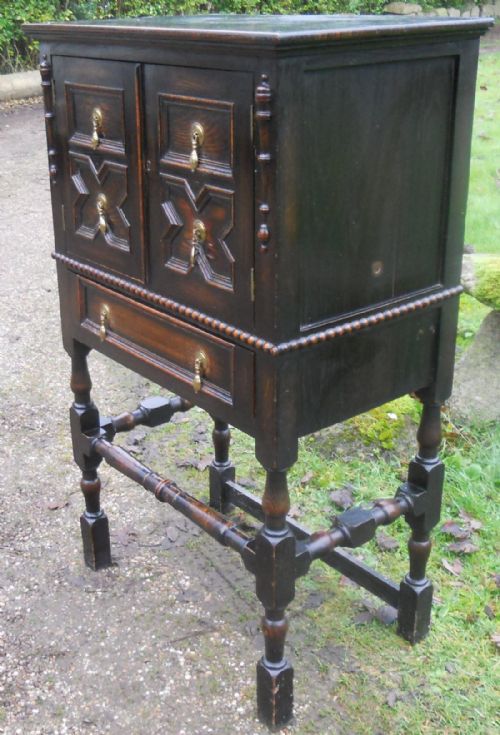 JACOBEAN STYLE OAK CUPBOARD ON STAND - ADDITIONAL PHOTO 2