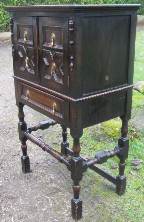 JACOBEAN STYLE OAK CUPBOARD ON STAND - ADDITIONAL PHOTO 3