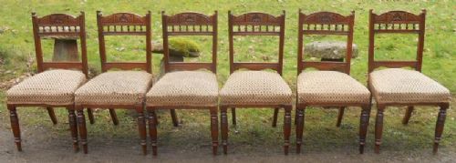 Set of Six Edwardian Carved Walnut Dining Chairs