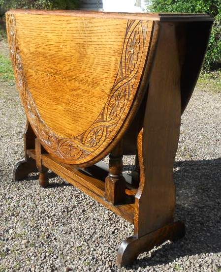 Carved Oak Oval Dropleaf Dining Table