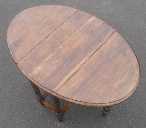 SMALL OAK OVAL GATELEG TABLE - ADDITIONAL PHOTO 8