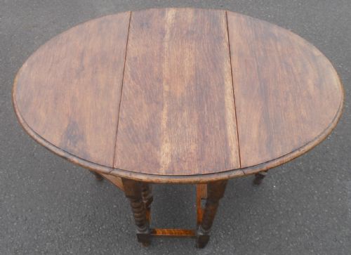 SMALL OAK OVAL GATELEG TABLE - ADDITIONAL PHOTO 9