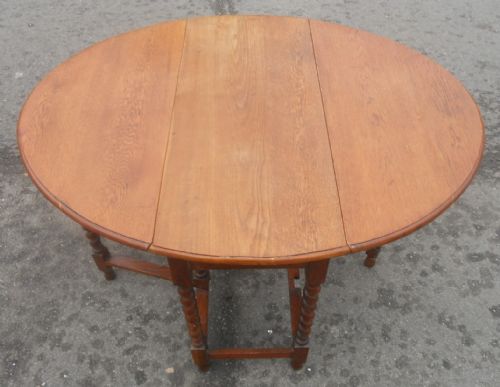 Golden Oak Oval Gateleg Dining Table