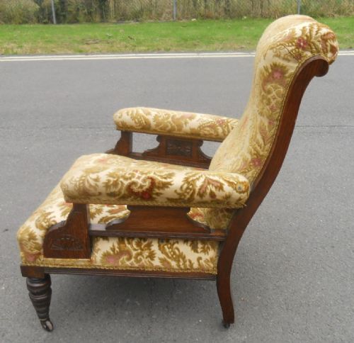 VICTORIAN MAHOGANY FRAMED UPHOLSTERED FIRESIDE ARMCHAIR - ADDITIONAL PHOTO 1