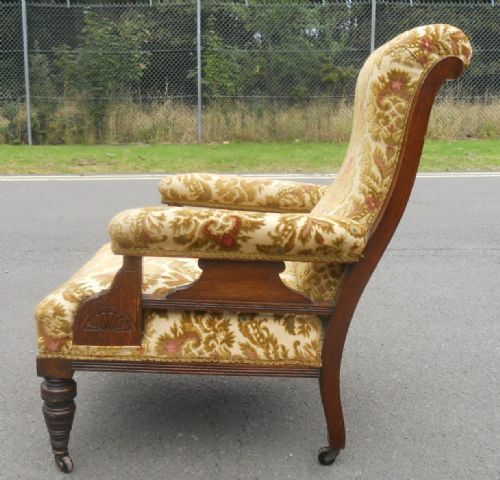 VICTORIAN MAHOGANY FRAMED UPHOLSTERED FIRESIDE ARMCHAIR - ADDITIONAL PHOTO 5