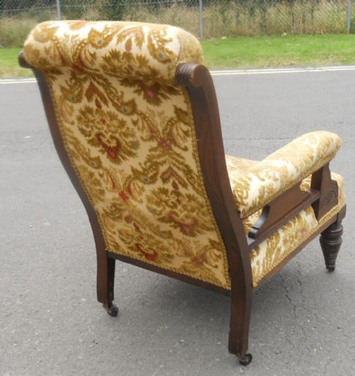 VICTORIAN MAHOGANY FRAMED UPHOLSTERED FIRESIDE ARMCHAIR - ADDITIONAL PHOTO 8