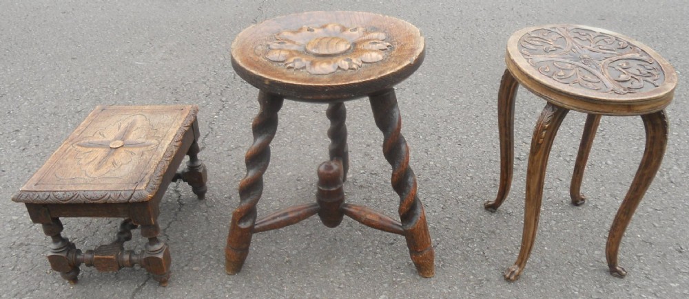 Three Edwardian Carved Oak Stools