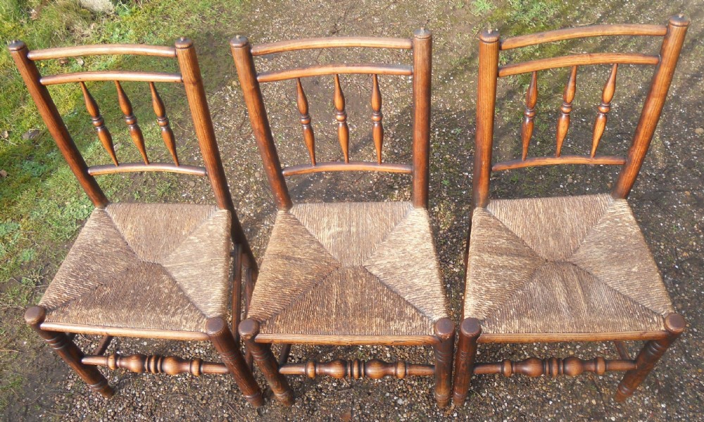 Set of Three Victorian Elm Spindle back Rush Seat Chairs  View II