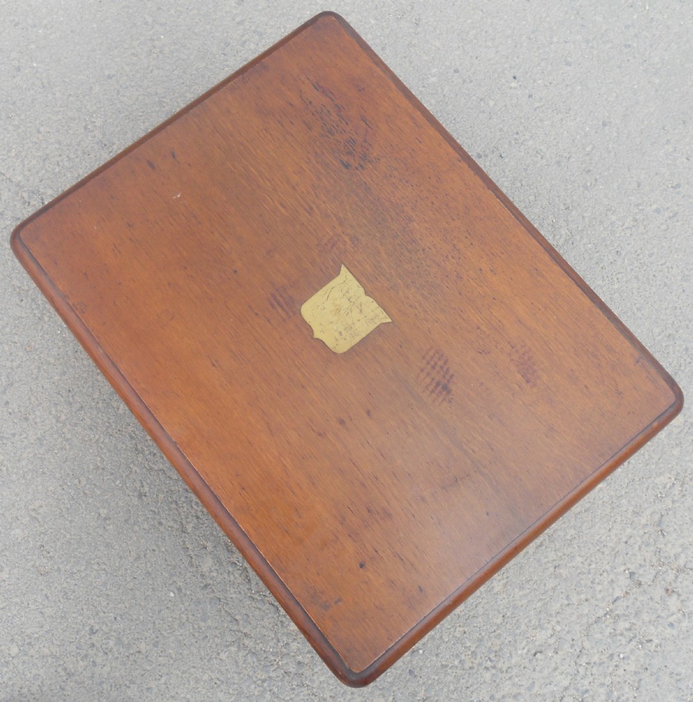 A large Victorian mahogany cutlery box featuring twin front panel doors, brass side handles, and a top brass plaque. View VIII