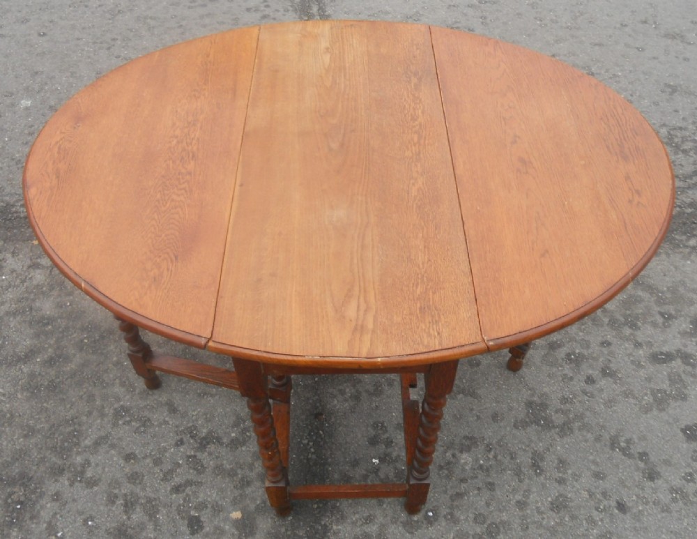 Golden Oak Oval Gateleg Dining Table 