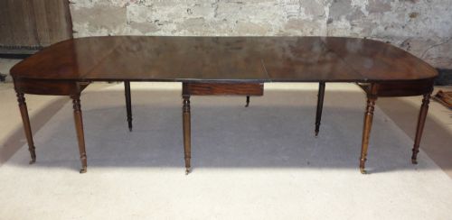 REGENCY CUBAN MAHOGANY EXTENDING DINING TABLE - ADDITIONAL PHOTO 1