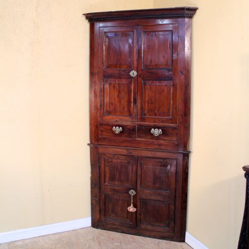 an 18th century georgian irish yew corner cupboard - CATEGORY: ANTIQUE CUPBOARDS - DATED 1850