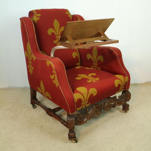 A 19TH CENTURY CARVED OAK WINGBACK READING CHAIR - ADDITIONAL PHOTO 1