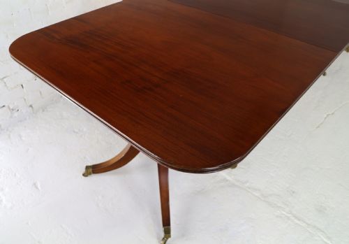 REGENCY LATER SOLID MAHOGANY EXTENDING TWO PILLAR DINING TABLE - ADDITIONAL PHOTO 9