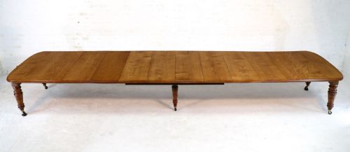 VICTORIAN OAK EXTENDING DINING TABLE 8 LEAVES 18FT SEATS 20 - ADDITIONAL PHOTO 3