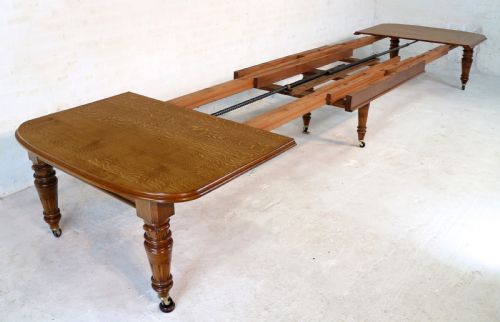 VICTORIAN OAK EXTENDING DINING TABLE 8 LEAVES 18FT SEATS 20 - ADDITIONAL PHOTO 13