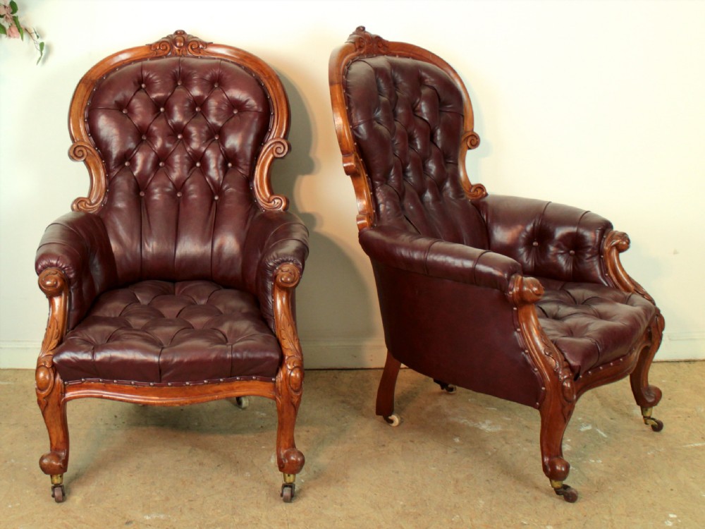 A pair of Victorian Mahogany & Burgundy Leather Library Armchairs View II