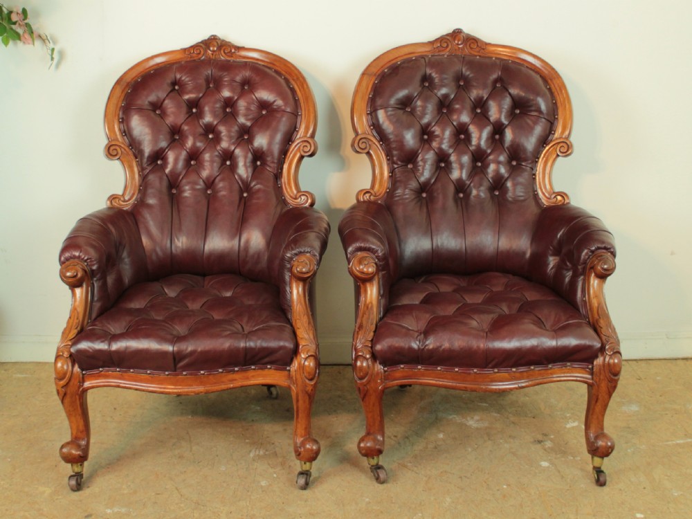 A pair of Victorian Mahogany & Burgundy Leather Library Armchairs View III