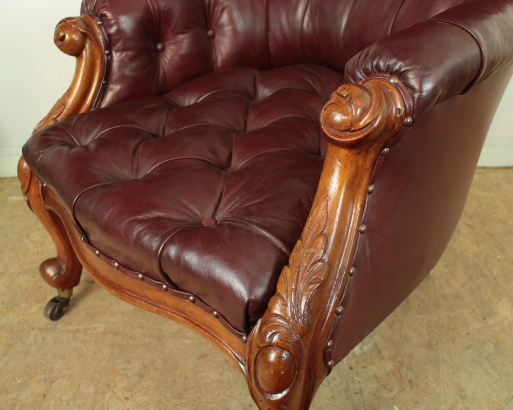 A pair of Victorian Mahogany & Burgundy Leather Library Armchairs View IX