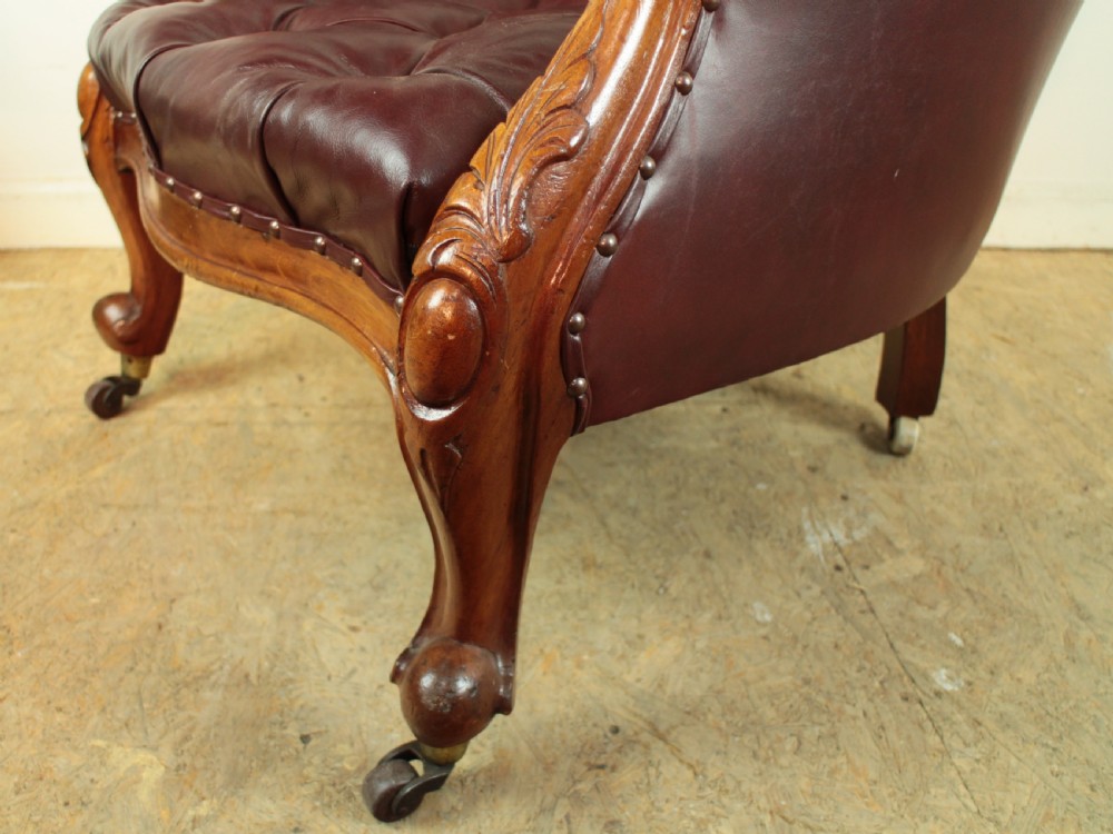 A pair of Victorian Mahogany & Burgundy Leather Library Armchairs View X