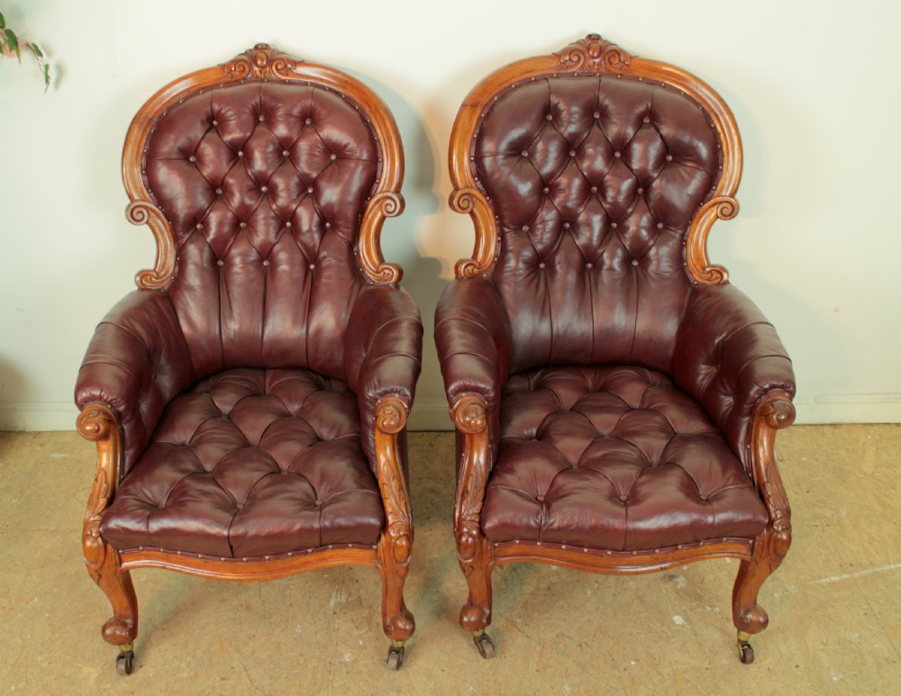 A pair of Victorian Mahogany & Burgundy Leather Library Armchairs View XIV