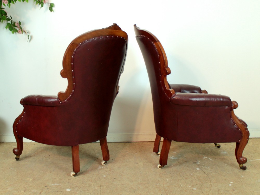 A pair of Victorian Mahogany & Burgundy Leather Library Armchairs View XV