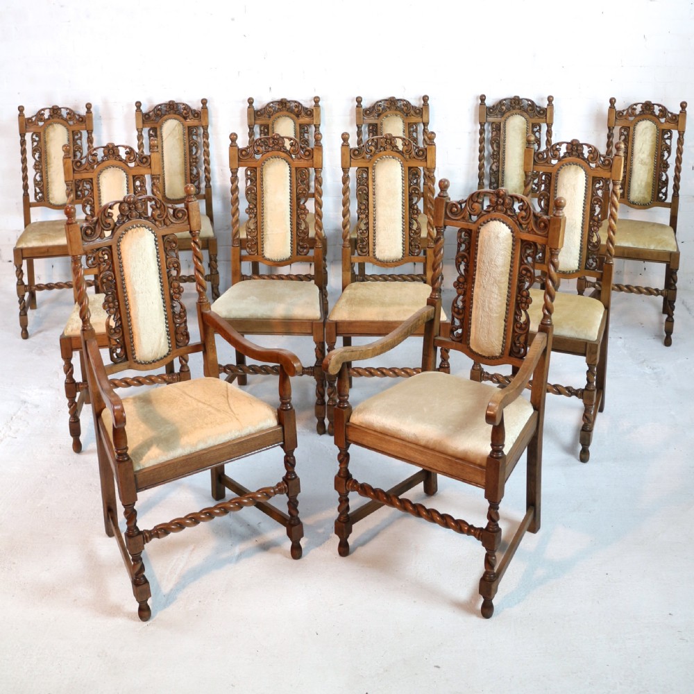Set of 12 Jacobean Revival Carved Oak Dining Chairs