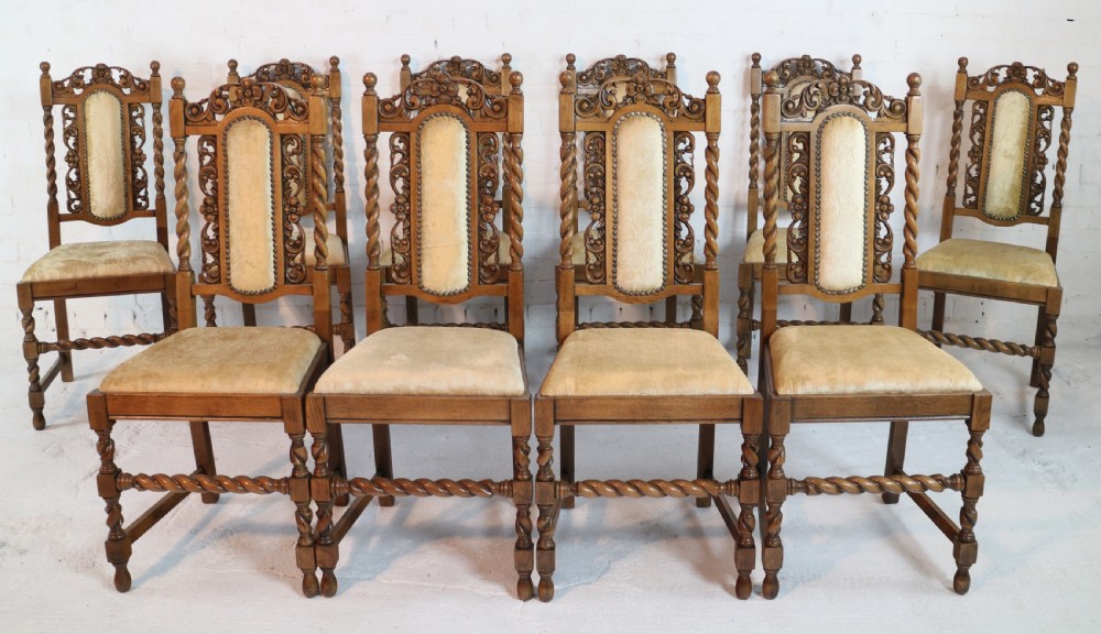 Set of 12 Jacobean Revival Carved Oak Dining Chairs View V
