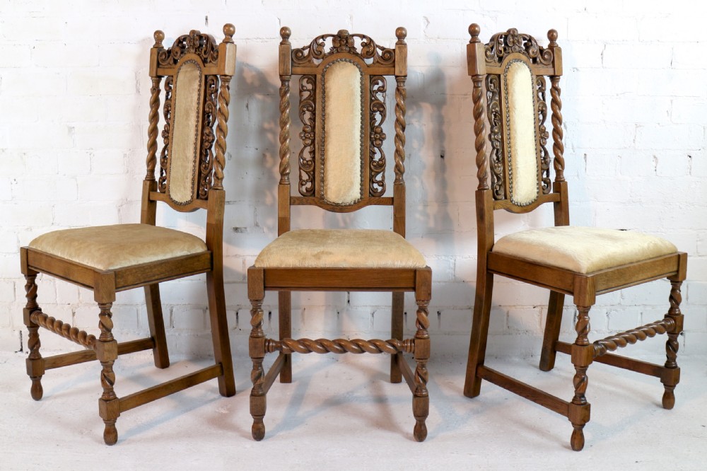 Set of 12 Jacobean Revival Carved Oak Dining Chairs View XII