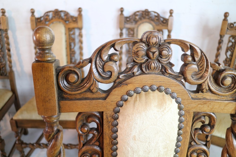 Set of 12 Jacobean Revival Carved Oak Dining Chairs View XXI