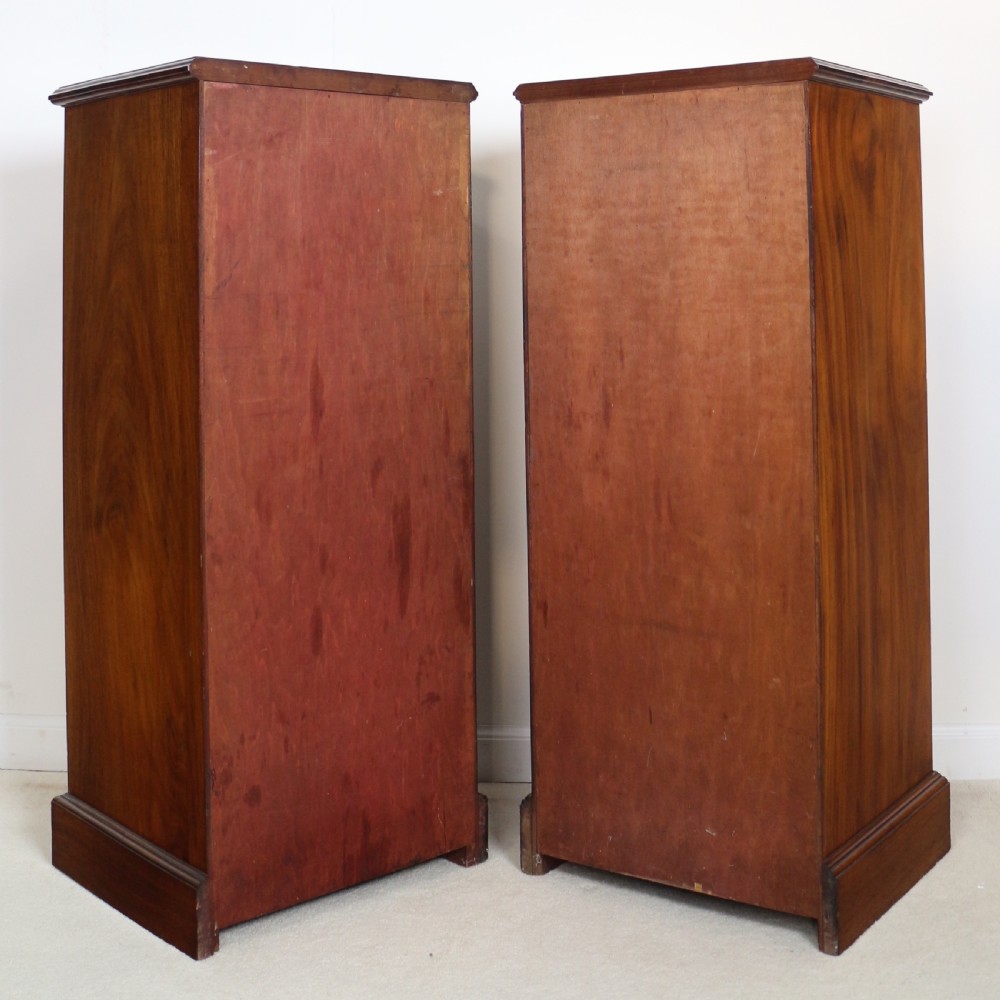 A pair of tall Scottish Late Victorian mahogany collectors chests with five drawers each, featuring brass drop handles and escutcheons. View XXIX