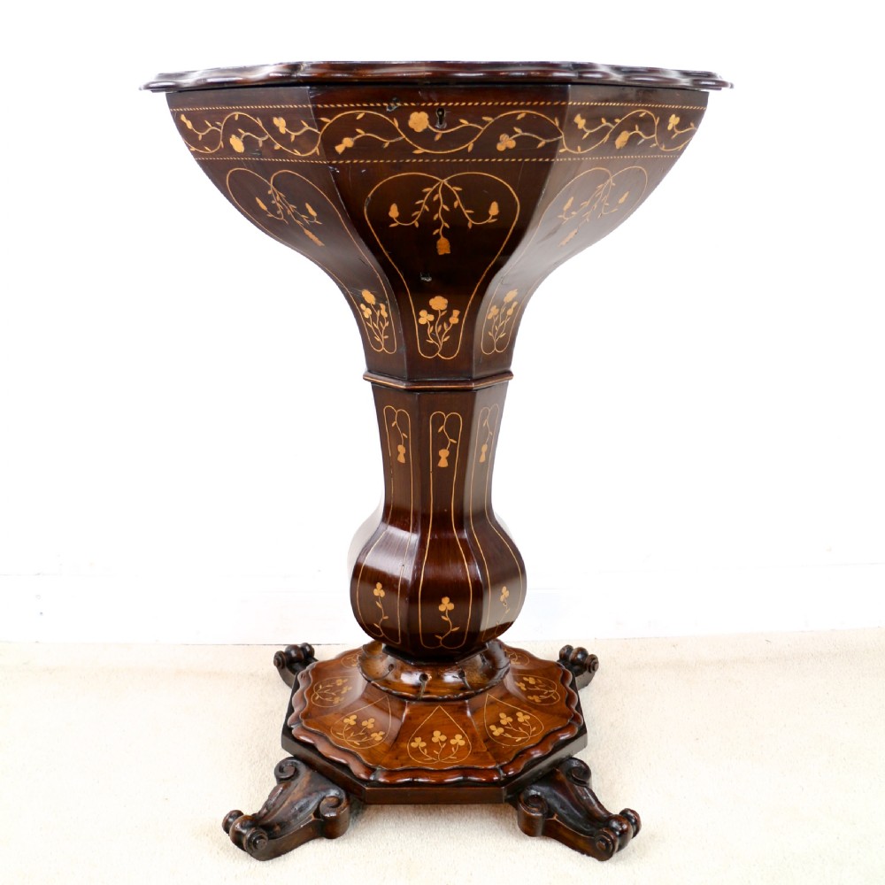 A Victorian Killarney Ware arbutus wood work table with a hinged scalloped top featuring shamrock marquetry on a faceted trumpet pedestal. View II