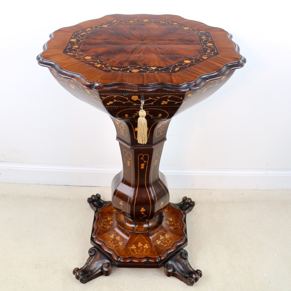 A Victorian Killarney Ware arbutus wood work table with a hinged scalloped top featuring shamrock marquetry on a faceted trumpet pedestal. View III