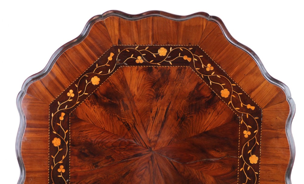 A Victorian Killarney Ware arbutus wood work table with a hinged scalloped top featuring shamrock marquetry on a faceted trumpet pedestal. View VII