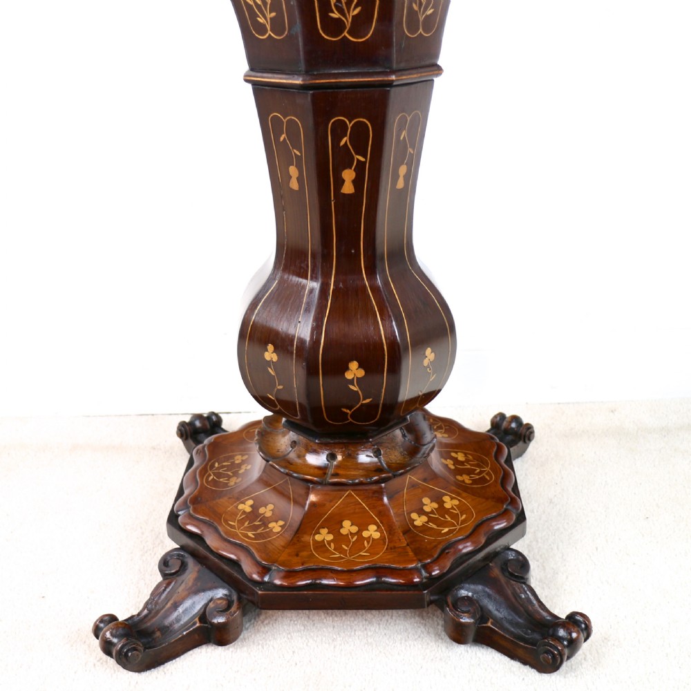 A Victorian Killarney Ware arbutus wood work table with a hinged scalloped top featuring shamrock marquetry on a faceted trumpet pedestal. View XIII