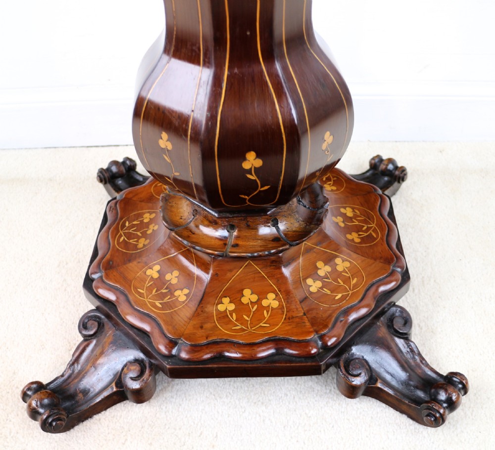 A Victorian Killarney Ware arbutus wood work table with a hinged scalloped top featuring shamrock marquetry on a faceted trumpet pedestal. View XV