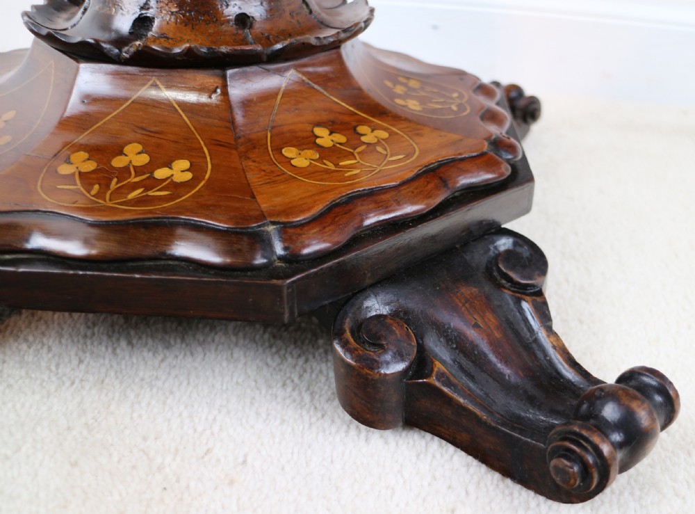 A Victorian Killarney Ware arbutus wood work table with a hinged scalloped top featuring shamrock marquetry on a faceted trumpet pedestal. View XVI