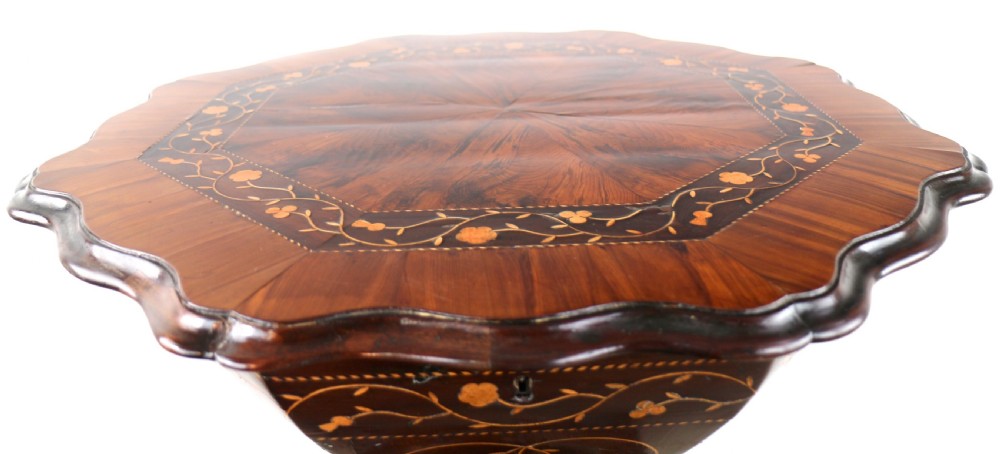 A Victorian Killarney Ware arbutus wood work table with a hinged scalloped top featuring shamrock marquetry on a faceted trumpet pedestal. View XX