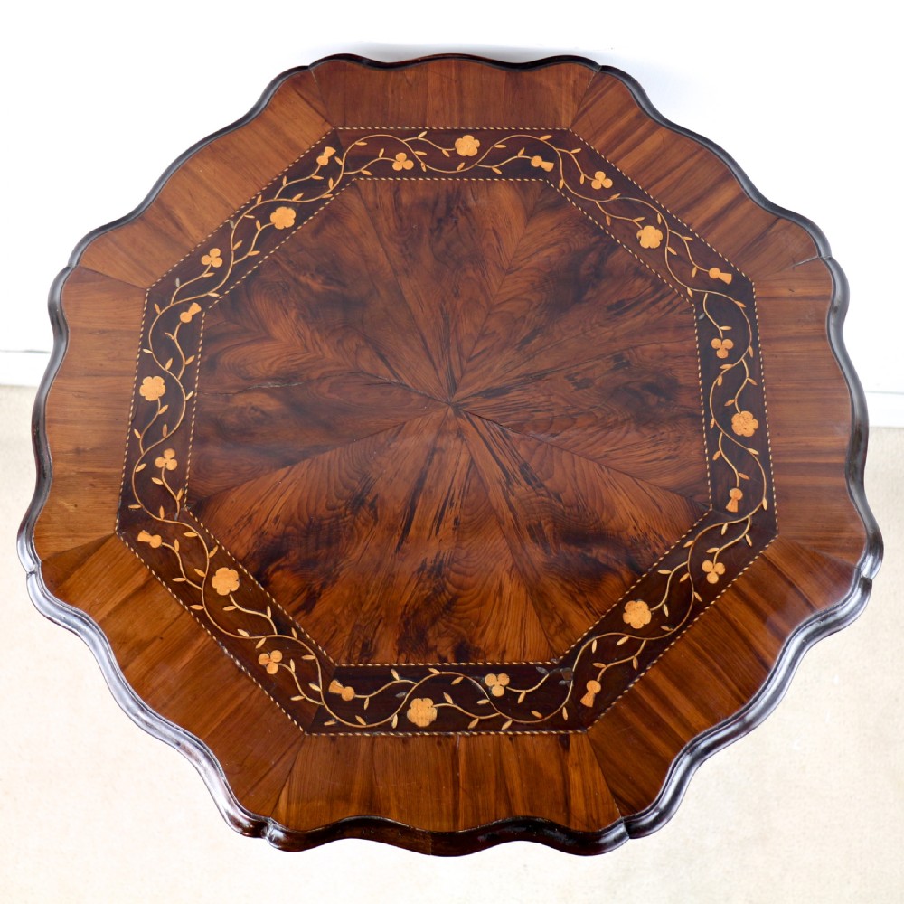 A Victorian Killarney Ware arbutus wood work table with a hinged scalloped top featuring shamrock marquetry on a faceted trumpet pedestal. View XXV