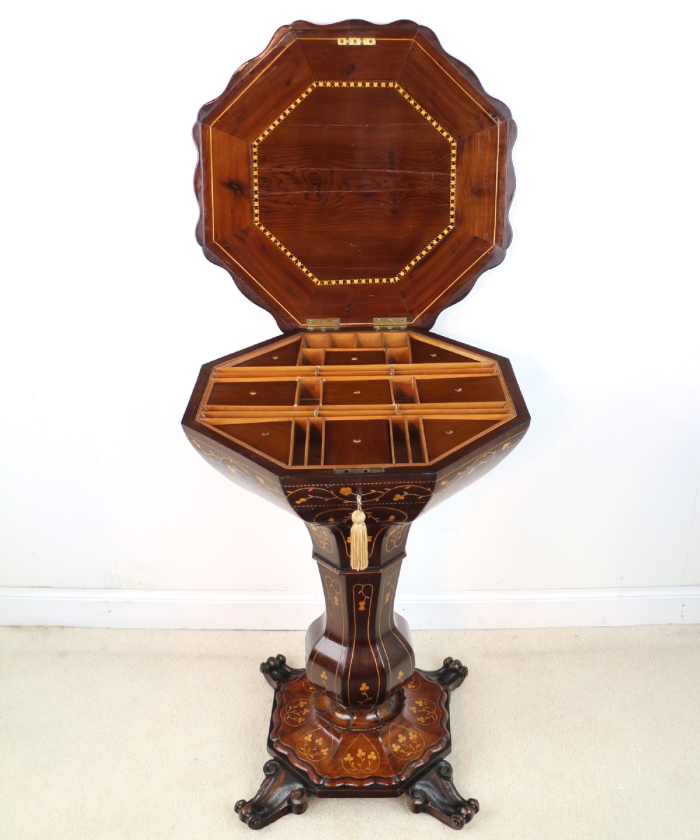 A Victorian Killarney Ware arbutus wood work table with a hinged scalloped top featuring shamrock marquetry on a faceted trumpet pedestal. View XXVII