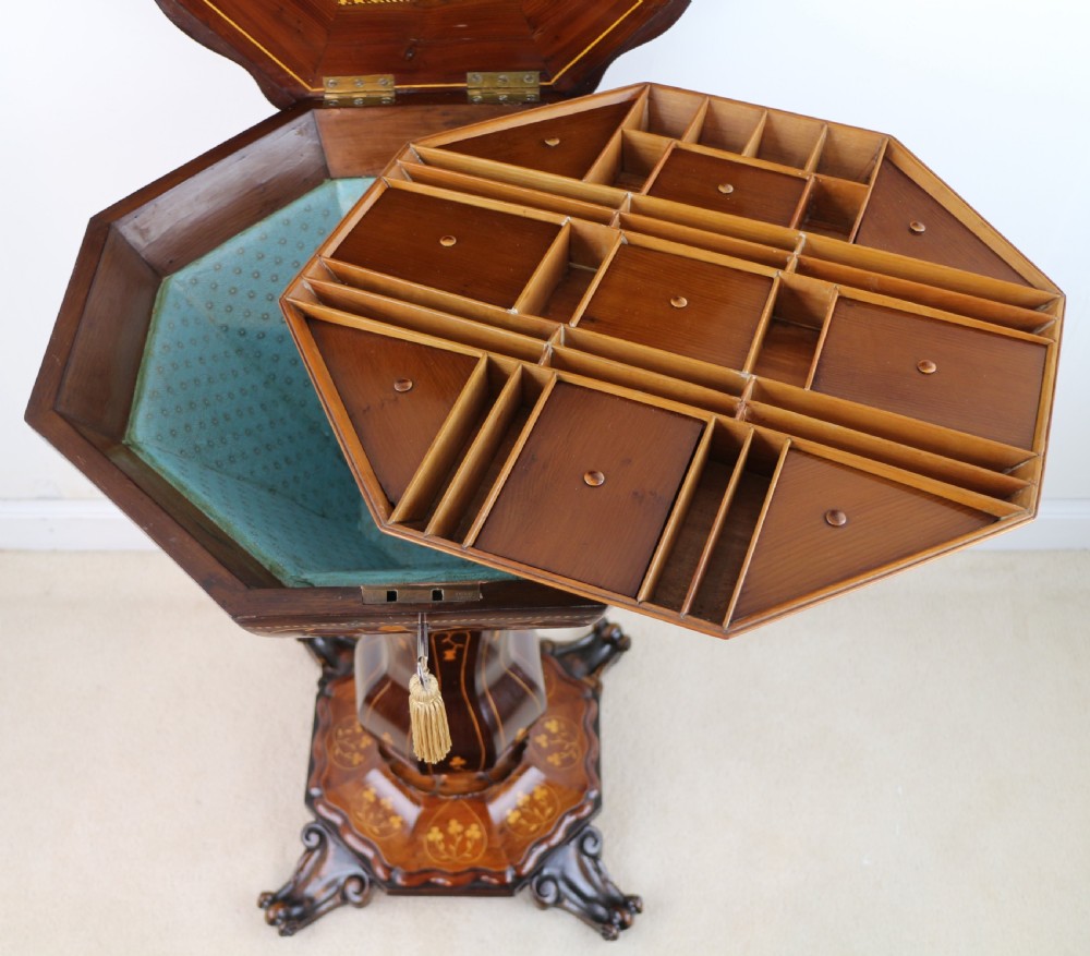 A Victorian Killarney Ware arbutus wood work table with a hinged scalloped top featuring shamrock marquetry on a faceted trumpet pedestal. View XXX