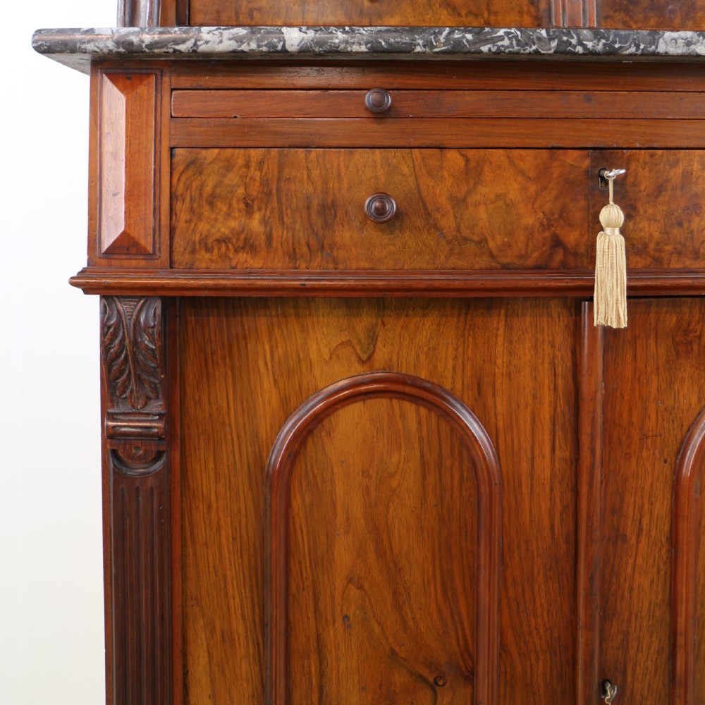 A 19th-century Victorian burr walnut dentist cabinet with a roll-top upper section, shallow drawers, grey marble work surface, and lower two-door cupboard. View XI