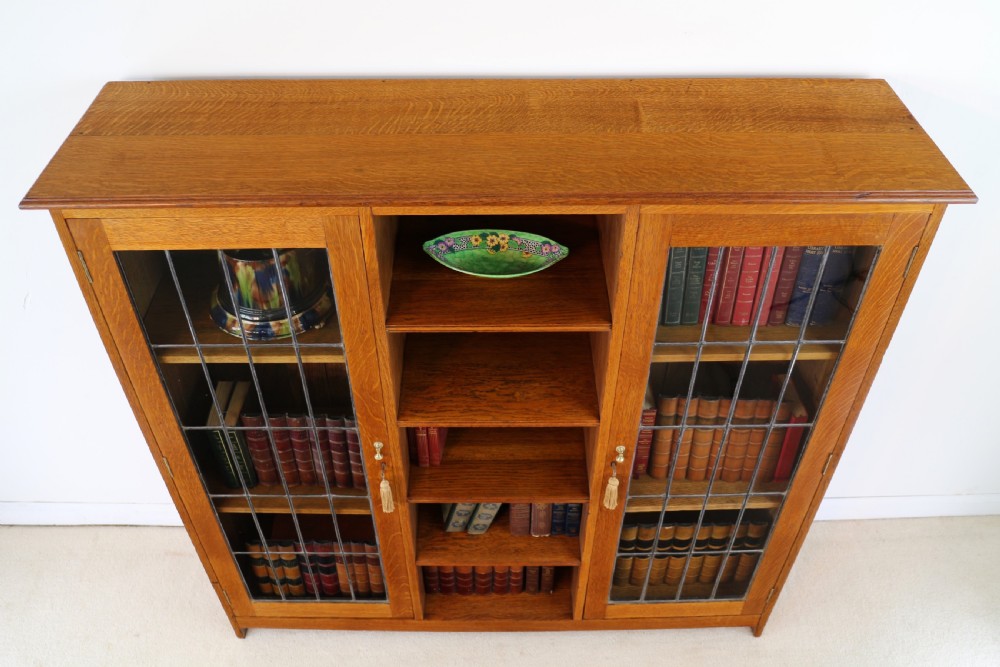 Arts & Crafts Oak Bookcase Cabinet attributed to Liberty & Co View XIII