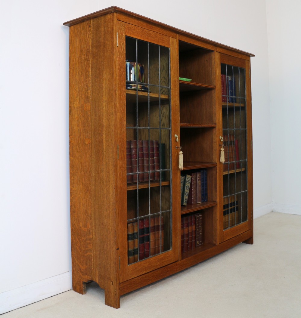 Arts & Crafts Oak Bookcase Cabinet attributed to Liberty & Co View XVI