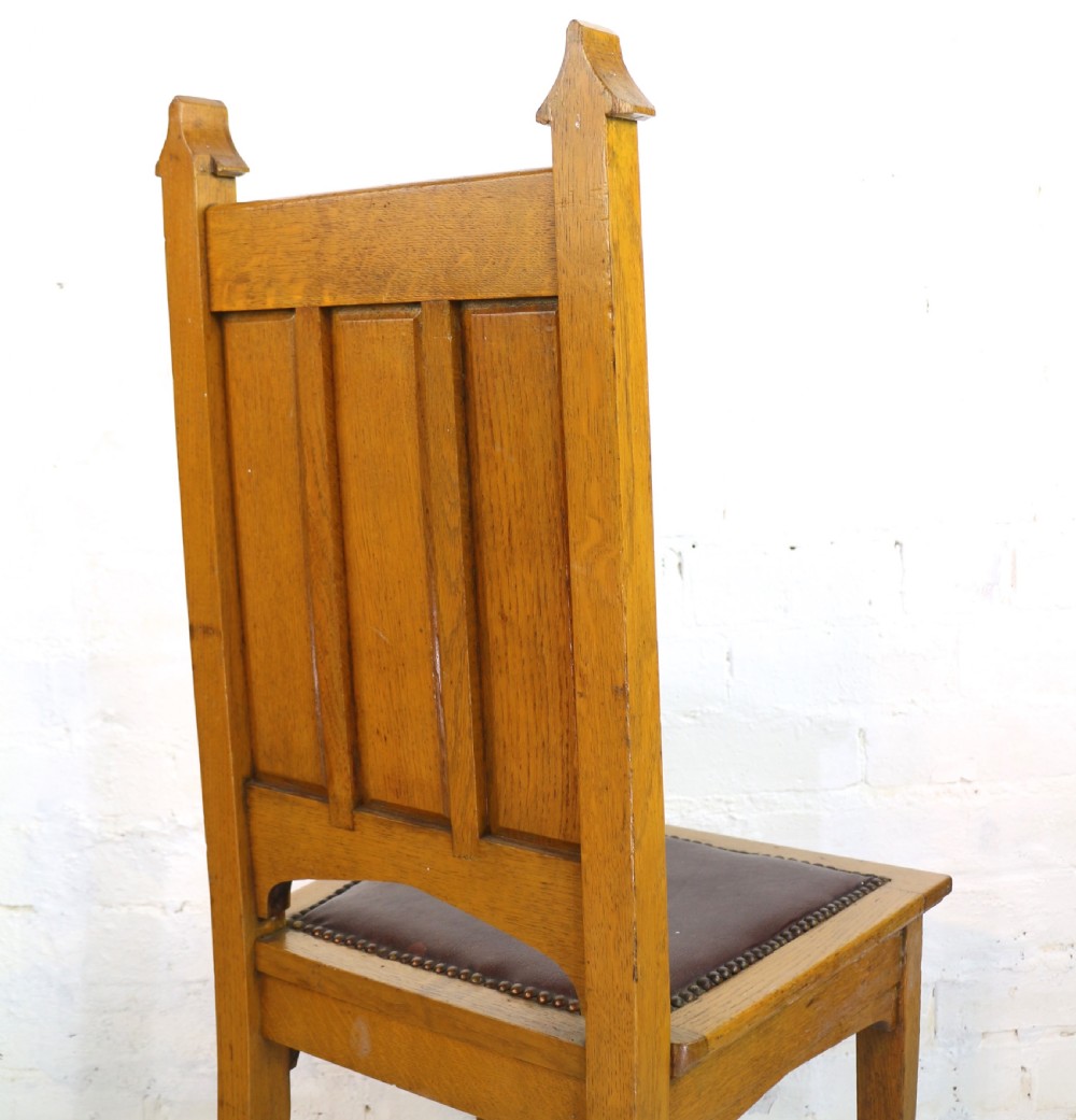 Set of Twelve Gothic Revival Arts & Crafts Oak Dining Chairs, Attributed to Shapland & Petter (12) View X